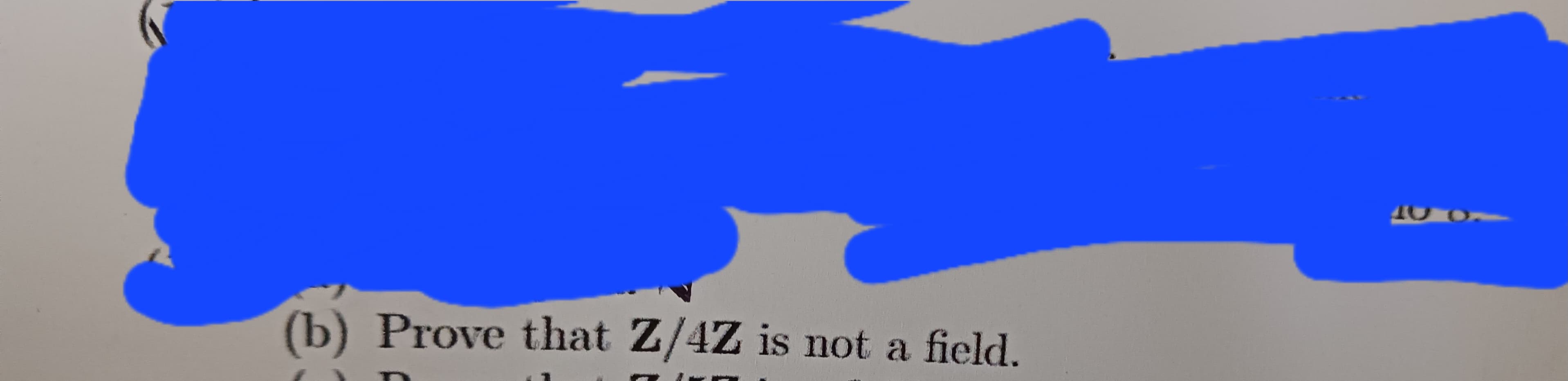(b) Prove that Z/4Z is not a field.