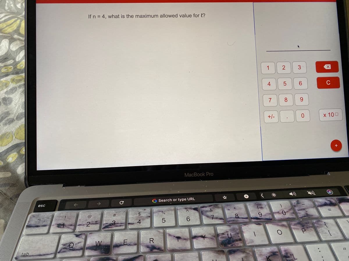 If n = 4, what is the maximum allowed value for {?
1
4
6.
C
8
9.
+/-
x 100
MacBook Pro
G Search or type URL
☆
esc
$4
&
%3D
4
6.
tab
2.
P.
