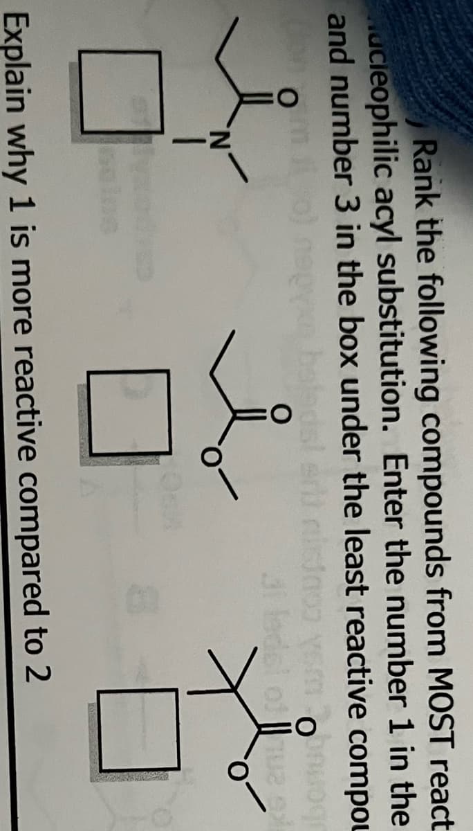 Rank the following compounds from MOST react
Mucieophilic acyl substitution. Enter the number 1 in the
and number 3 in the box under the least reactive compou
om
bajada!
517
om oonuod
O
ofque ex
Explain why 1 is more reactive compared to 2