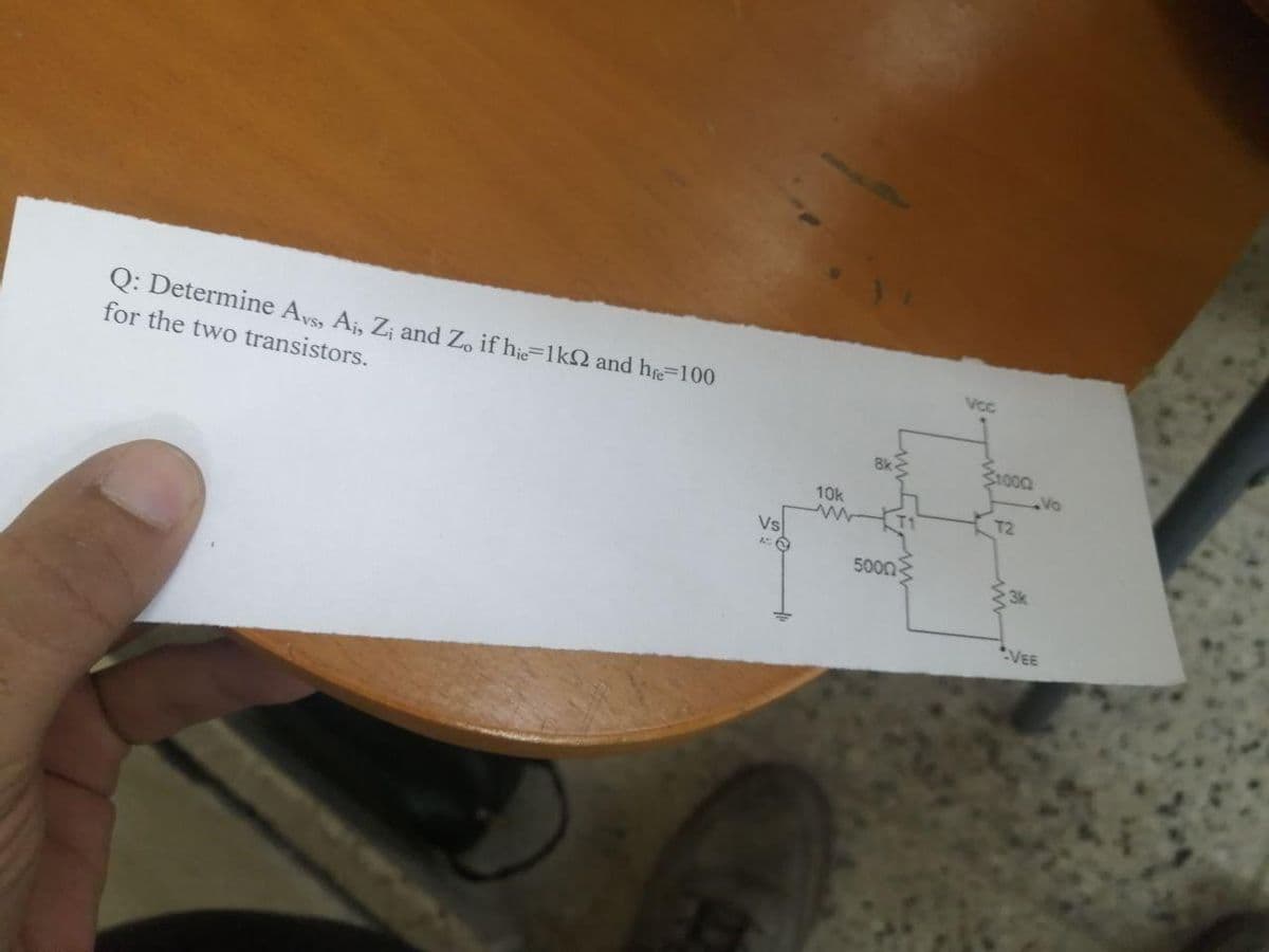 Q: Determine Ays A, Z; and Z, if hi=1k2 and h 100
for the two transistors.
Vcc
8k
31000
10k
T2
Vs
5000
*VEE
