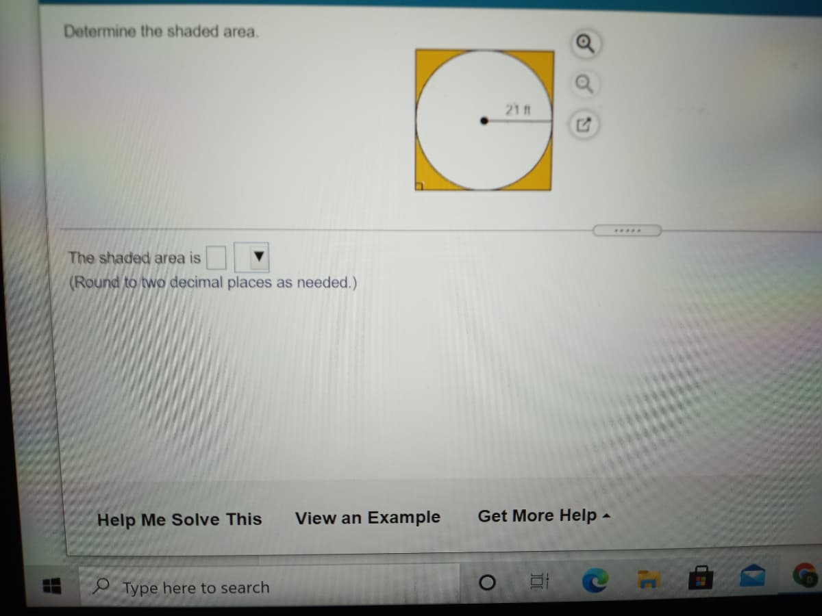 Determine the shaded area.
21 t
The shaded area is
(Round to two decimal places as needed.)
Help Me Solve This
View an Example
Get More Help -
Type here to search
