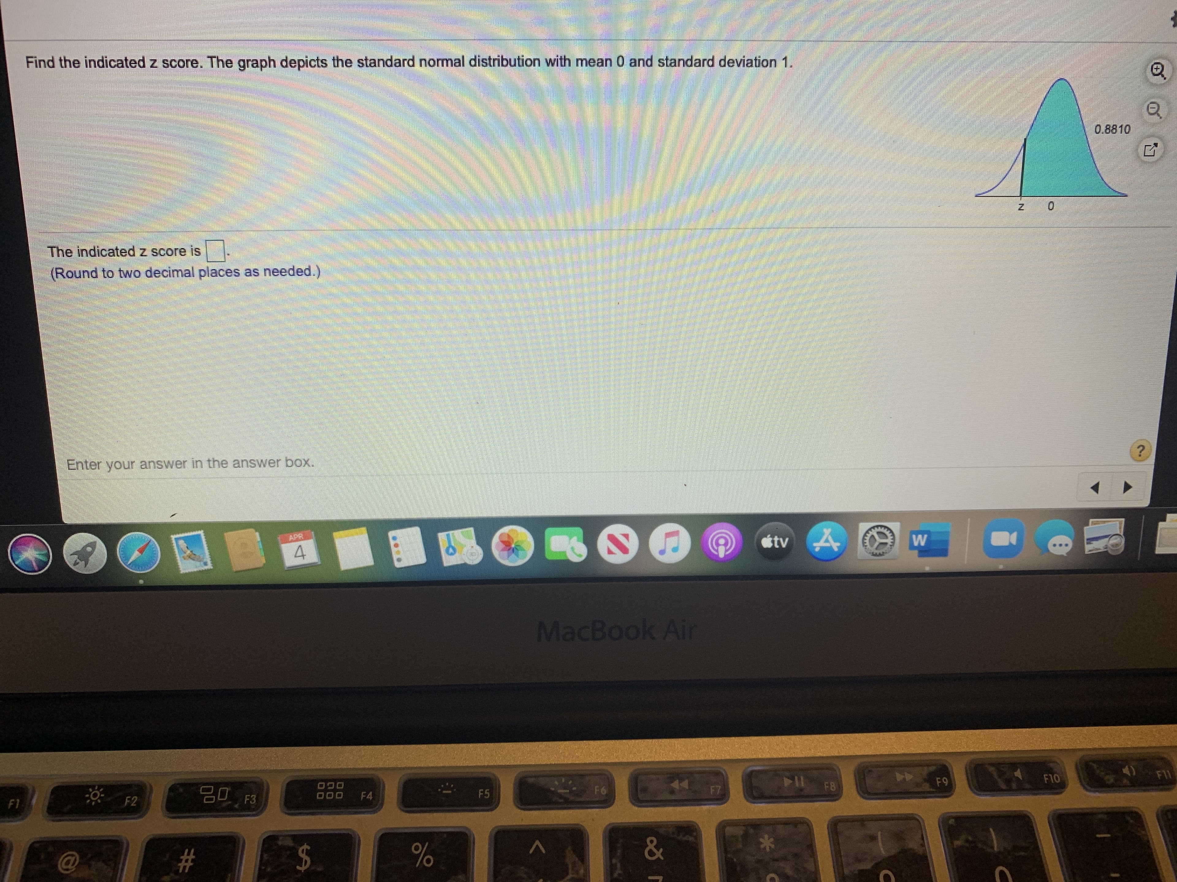 Find the indicated z score. The graph depicts the standard normal distribution with mean 0 and standard deviation 1.
0.8810
0.
The indicated z score is
(Round to two decimal places as needed.)
Enter your answer in the answer box.
tv
4.
MacBook Air
F10
F11
F8
F9
20 F3
OGO
F4
F5
F6
F7
D00
F1
F2
&
%24
%23
