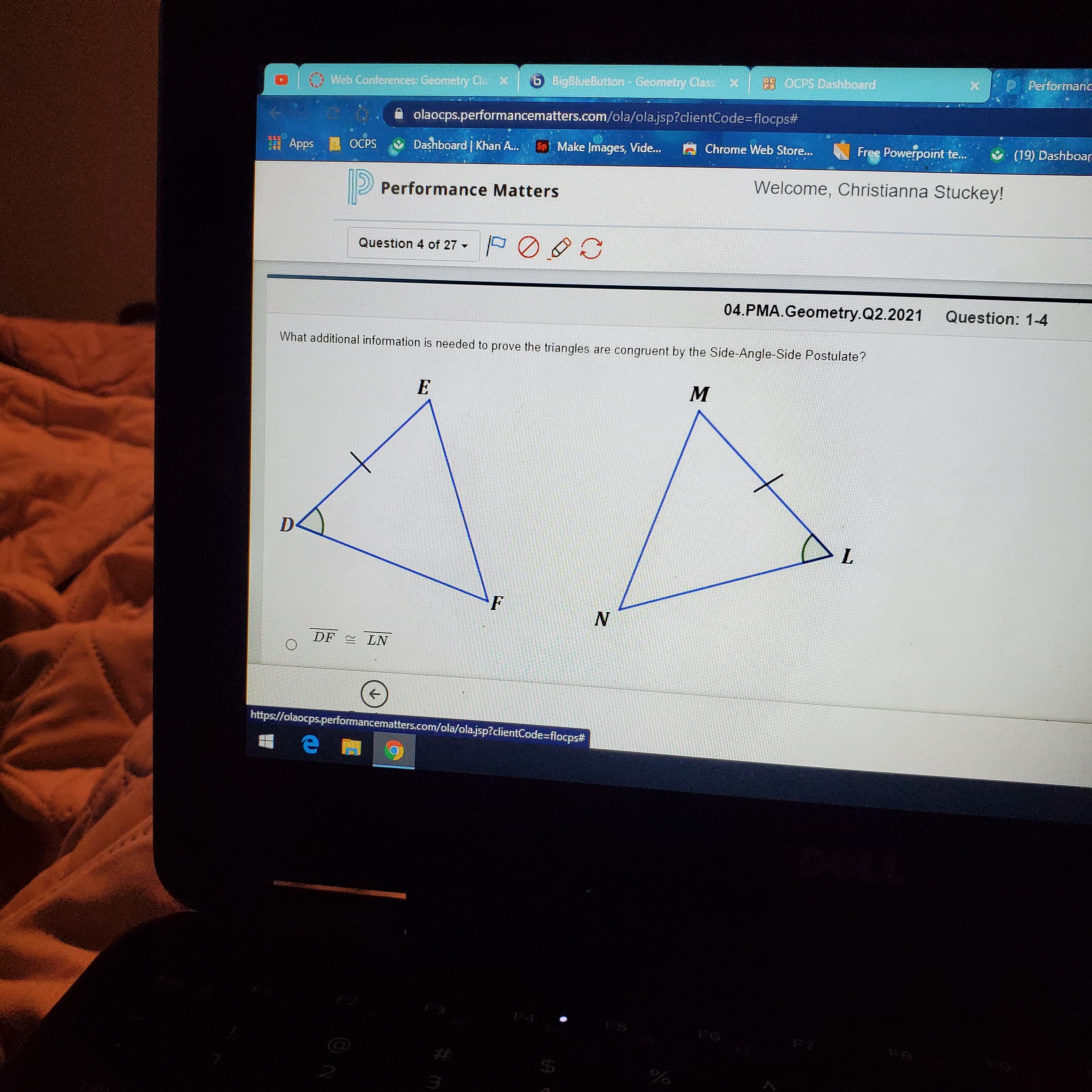 What additional information is needed to prove the triangles are congruent by the Side-Angle-Side Postulate?
E
D-
F
