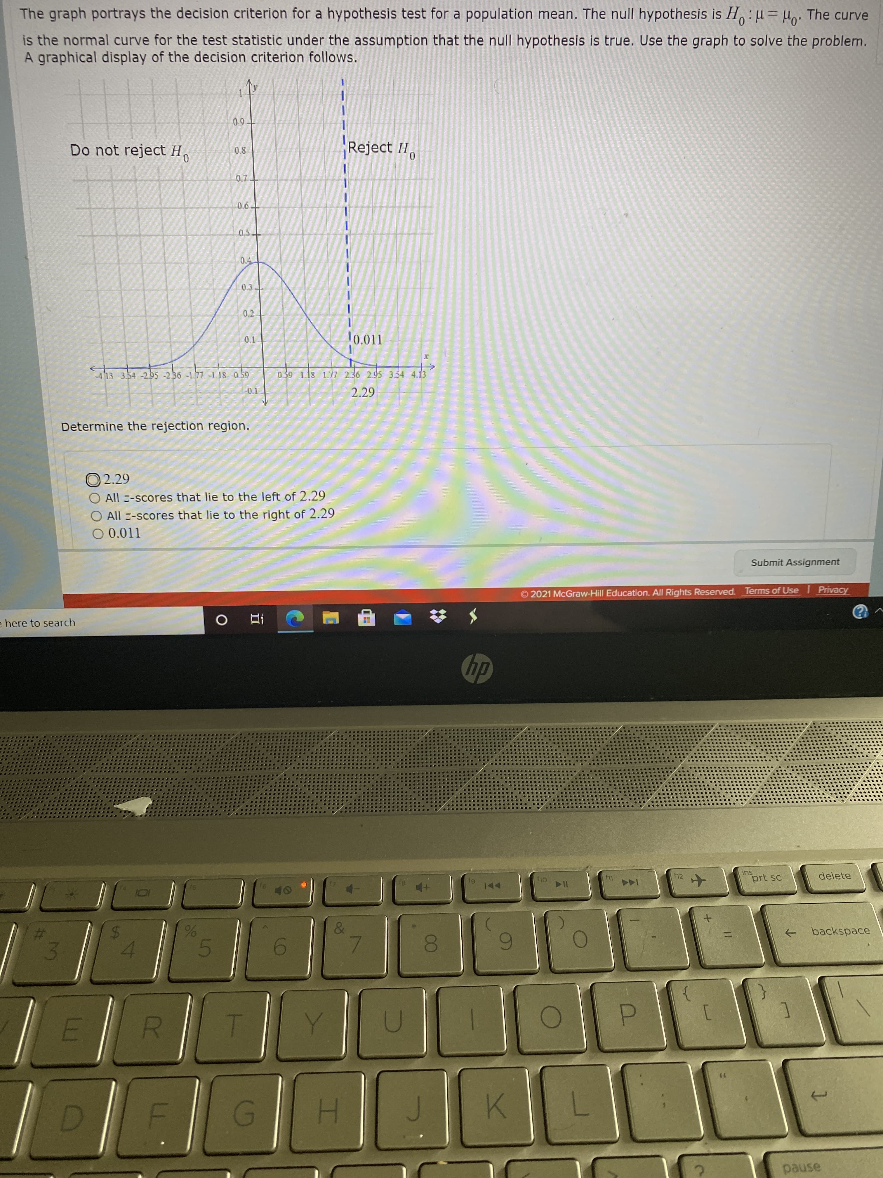 Determine the rejection region.
O 2.29
All -scores that lie to the left of 2.29
O All -scores that lie to the right of 2.29
O 0.011
