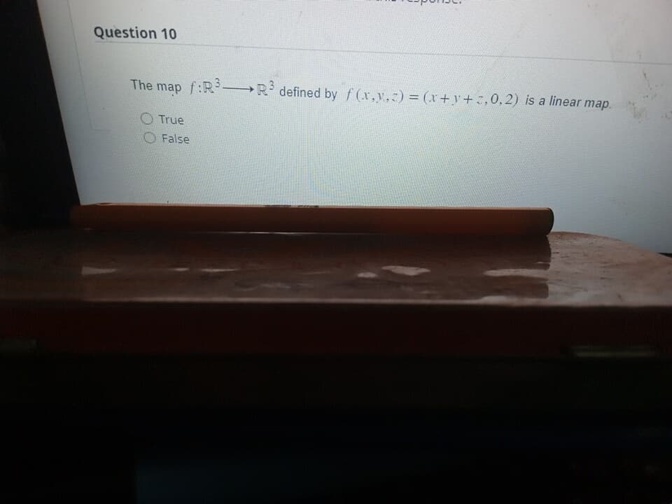 Question 10
The map f:R³ R³ defined by f(x,y,z) = (x+y+z.0.2) is a linear map.
True
False