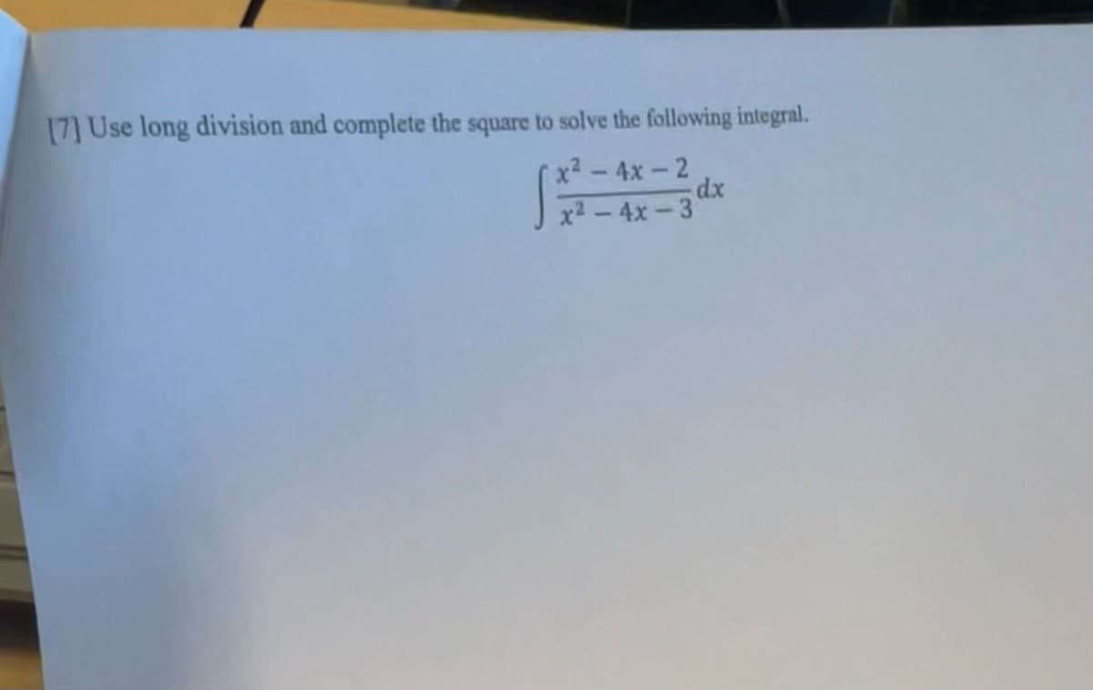 [7] Use long division and complete the square to solve the following integral.
x² - 4x-2
x²-4x-3
dx