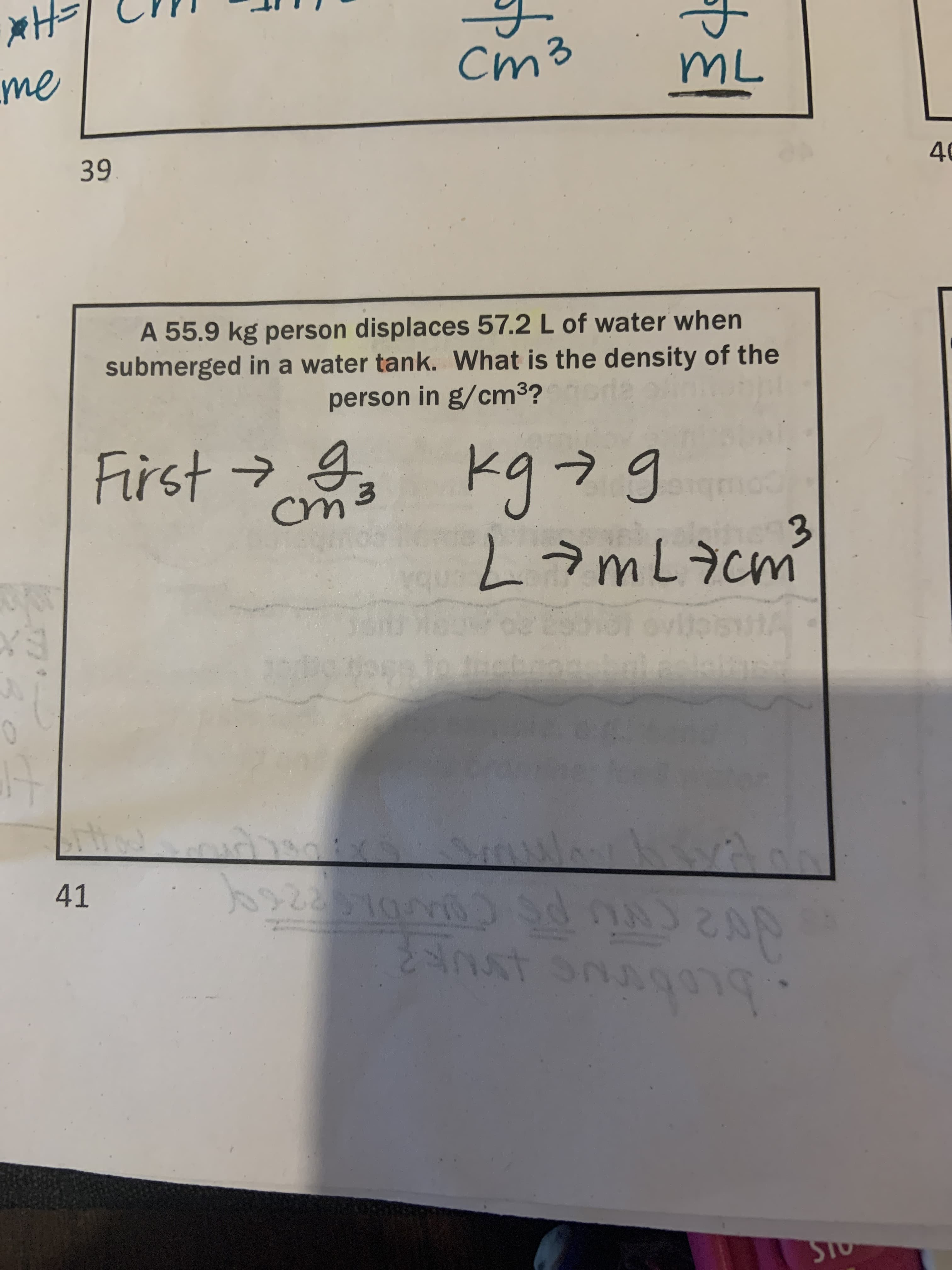 Cm3
me
39
40
A 55.9 kg person displaces 57.2 L of water when
submerged in a water tank. What is the density of the
person in g/cm3?
First > kg79
kg→g
LamLacmi
41
STO
