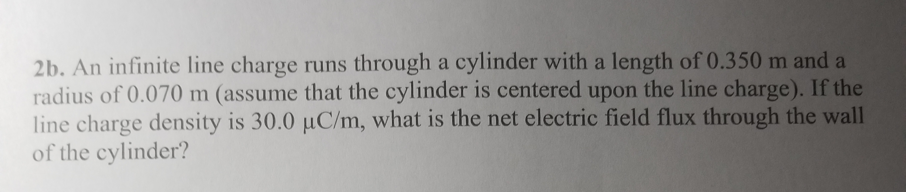 line charge density is 30.0 µC/m, what is the net electric field flux through the wall
of the cylinder?
