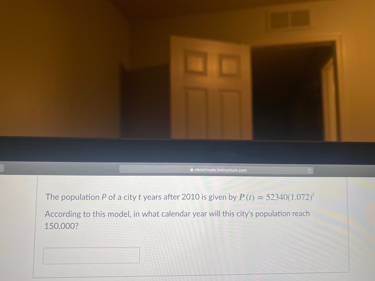 A nkcschools.instructure.com
The population P of a city t years after 2010 is given by P (t) = 52340(1.072)'
According to this model, in what calendar year will this city's population reach
150,000?
