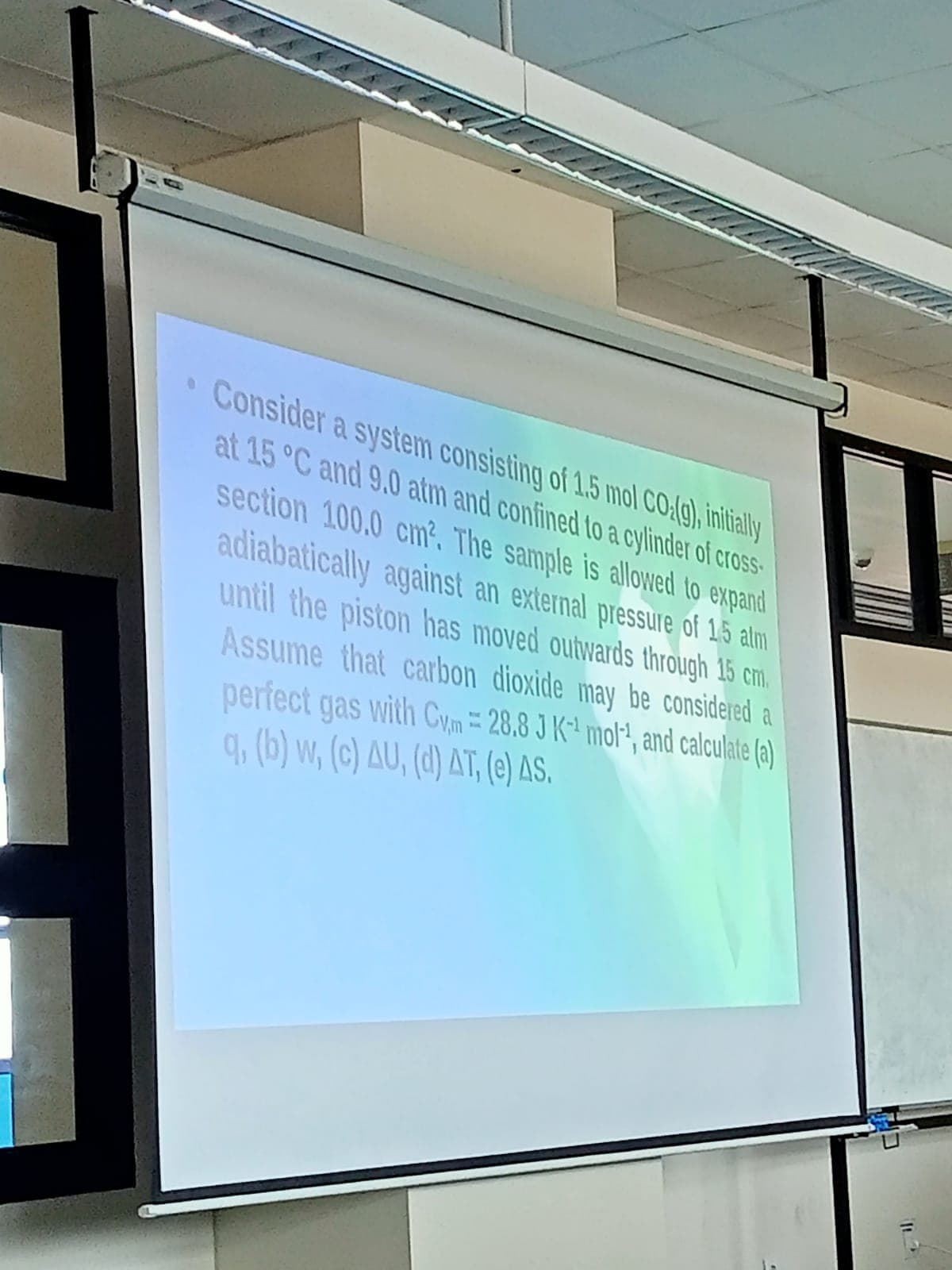 • Consider a system consisting of 1.5 mol CO.(g), initially
at 15 °C and 9.0 atm and confined to a cylinder of cross-
section 100.0 cm². The sample is allowed to expand
adiabatically against an external pressure of 15 alm
until the piston has moved outwards through 15 cm.
Assume that carbon dioxide may be considered a
perfect gas with Cym= 28.8 J K-¹ mol-¹, and calculate (a)
q, (b) w, (c) AU, (d) AT, (e) AS.
1.
MIKE'S