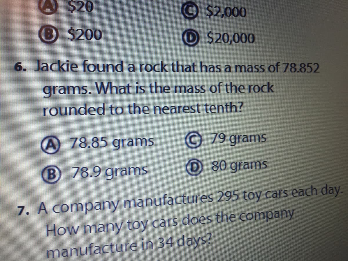 Jackie found a rock that has a mass of 78.852
grams. What is the mass of the rock
rounded to the nearest tenth?
