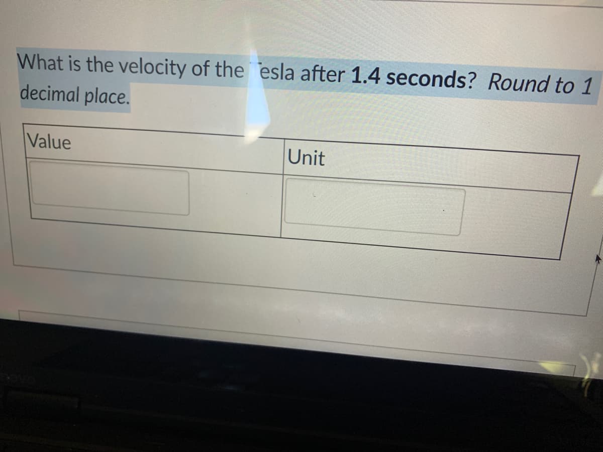 What is the velocity of the esla after 1.4 seconds? Round to 1
decimal place.
Value
Unit

