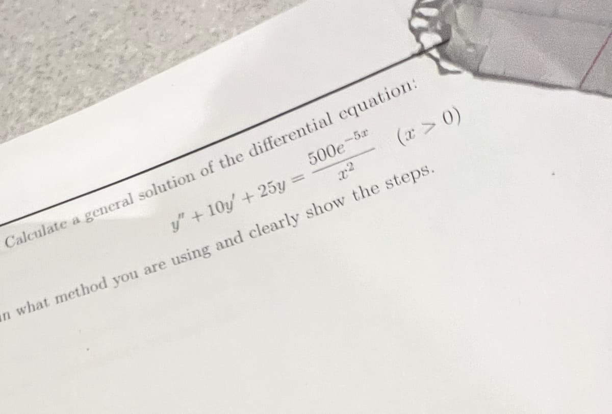 Calculate a general solution of the differential equation:
500e-
y" + 10y' + 25y
(x > 0)
2:2
in what method you are using and clearly show the steps.