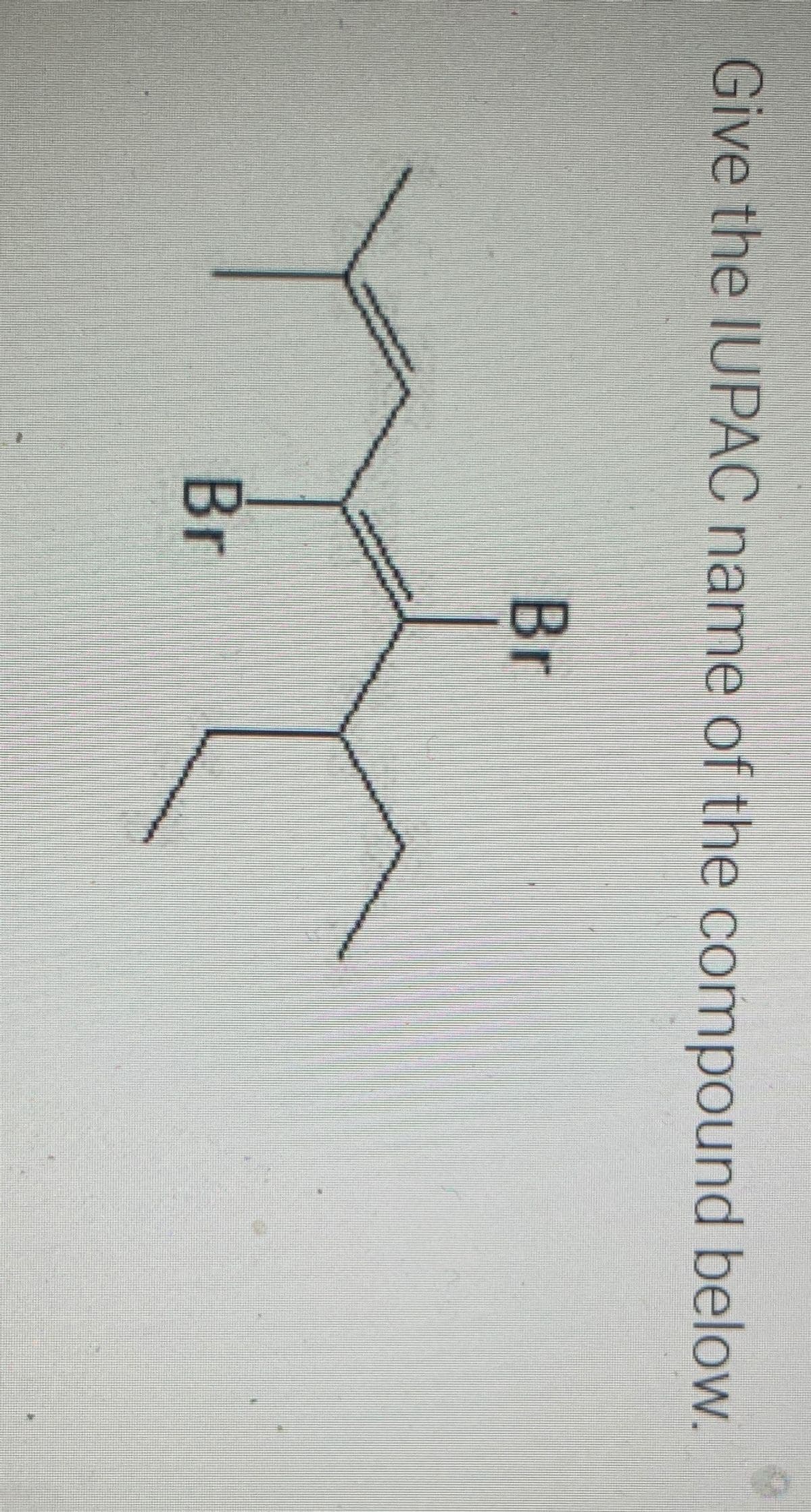 Give the IUPAC name of the compound below.
Br
Br