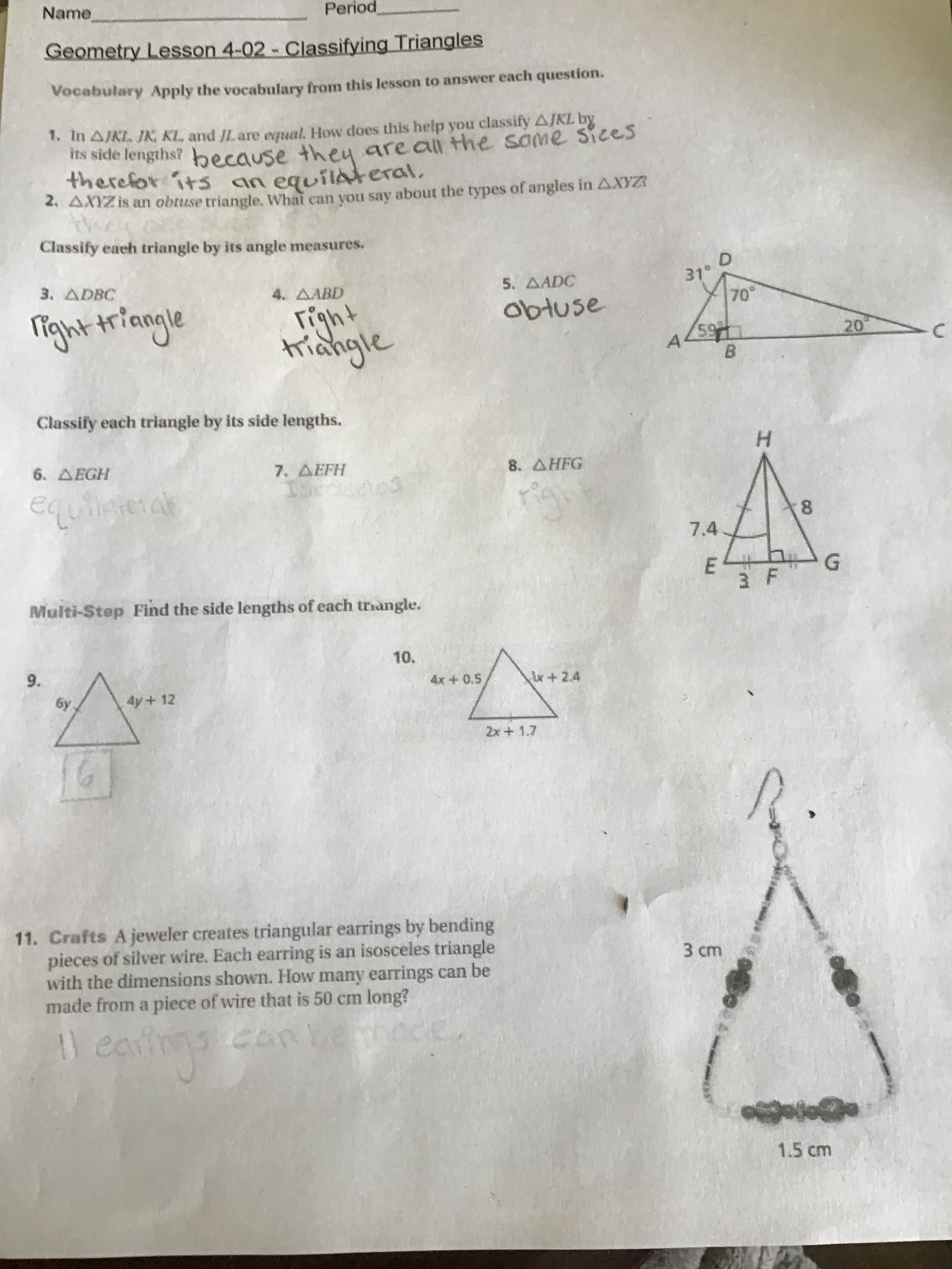 11. Crafts A jeweler creates triangular earrings by bending
pieces of silver wire. Each earring is an isosceles triangle
with the dimensions shown. How many earrings can be
made from a piece of wire that is 50 cm long?
3 cm
can
