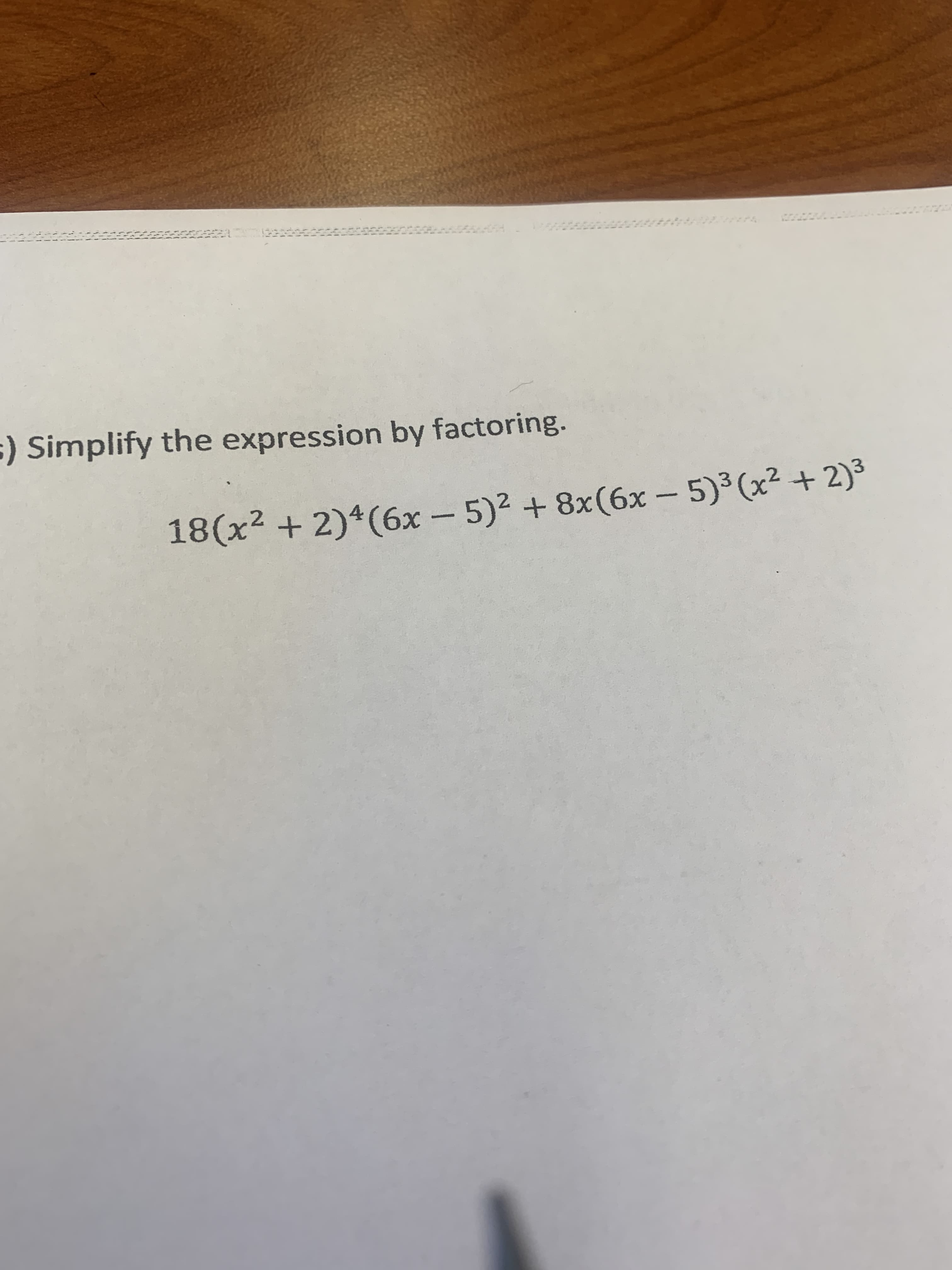 Simplify the expression by factoring.
