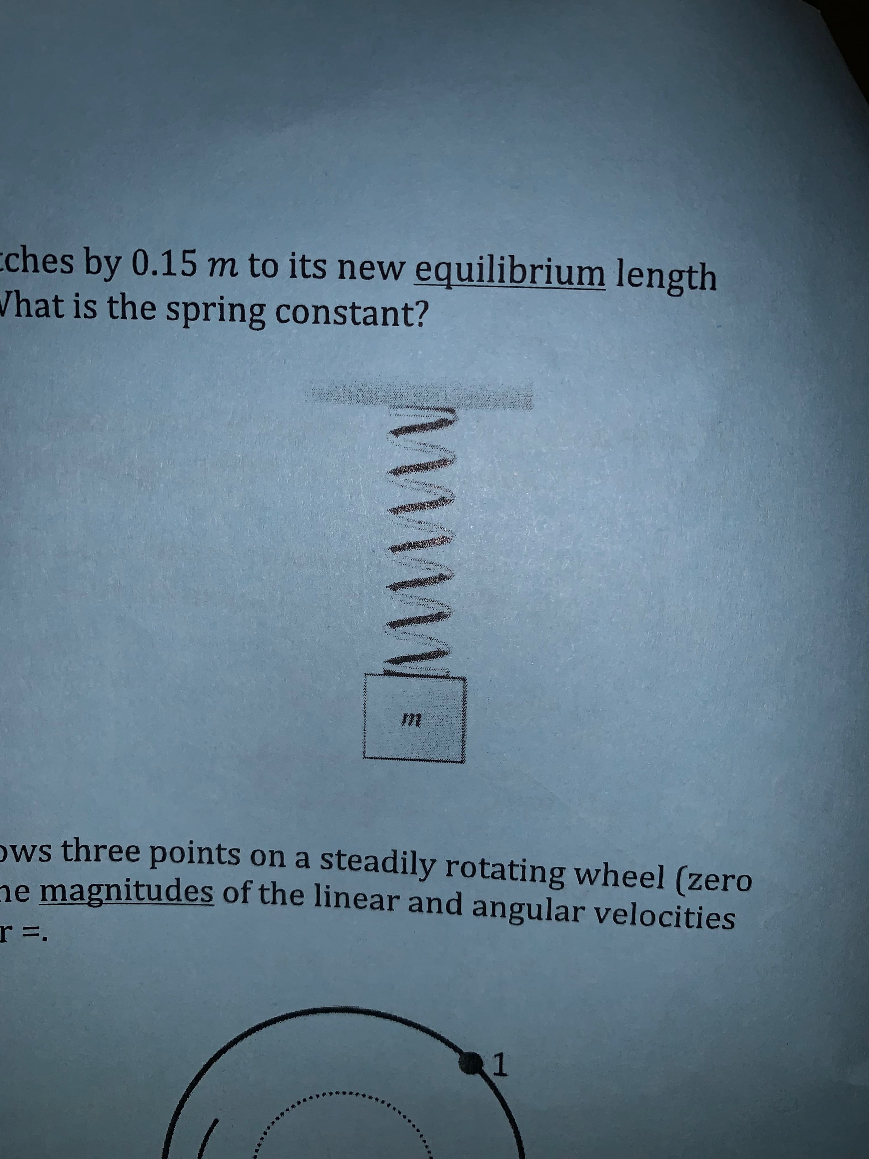 cches by 0.15 m to its new equilibrium length
hat is the spring constant?
m*
ws three points on a steadily rotating wheel (zero
e magnitudes of the linear and angular velocities
r =
1
M
