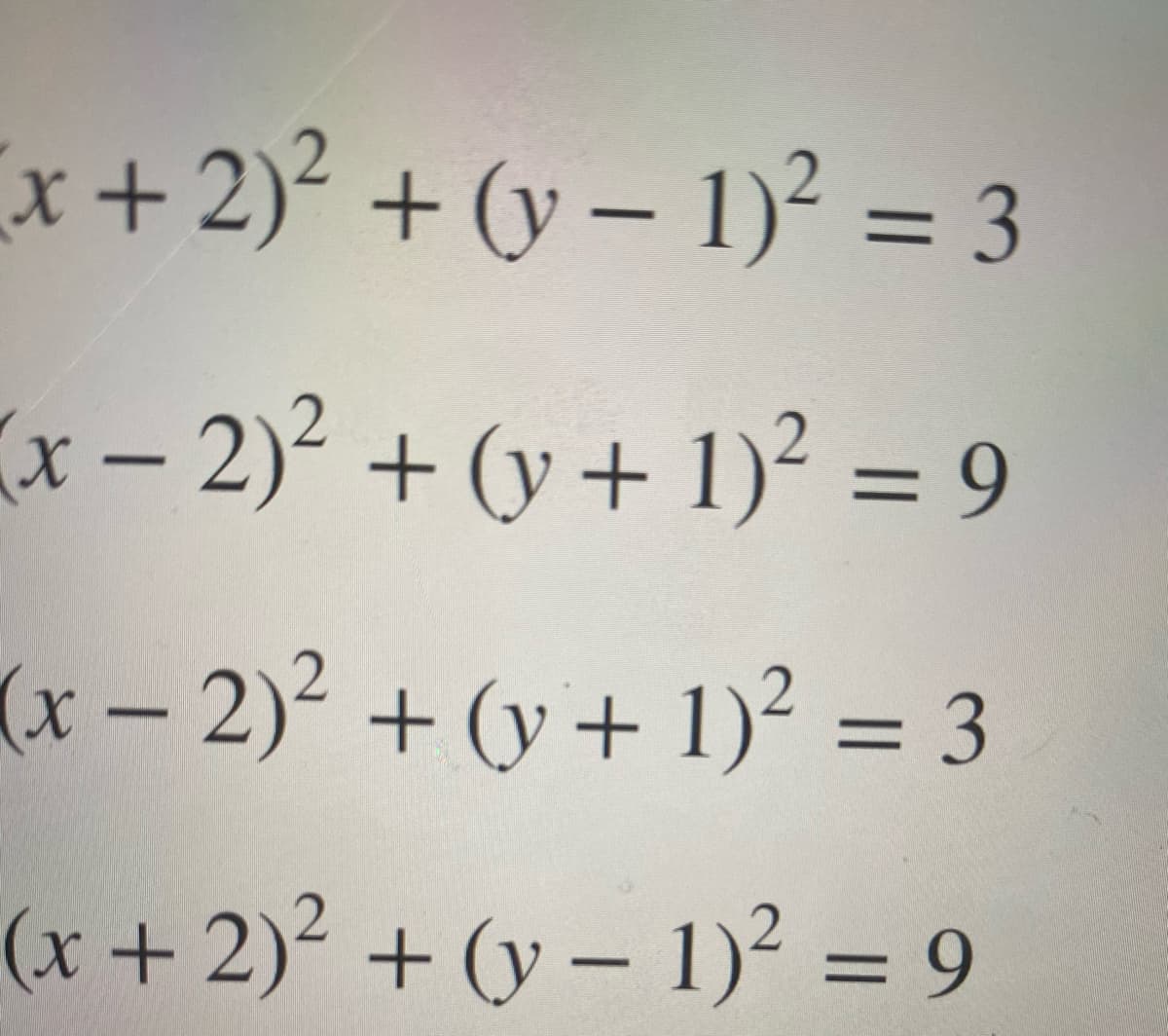 x+2)² + (y – 1)² = 3
%3D
(x-2) + (y+ 1)² = 9
%3D
(x-2)² + (y + 1)² = 3
(x + 2)² + (y – 1)² = 9
