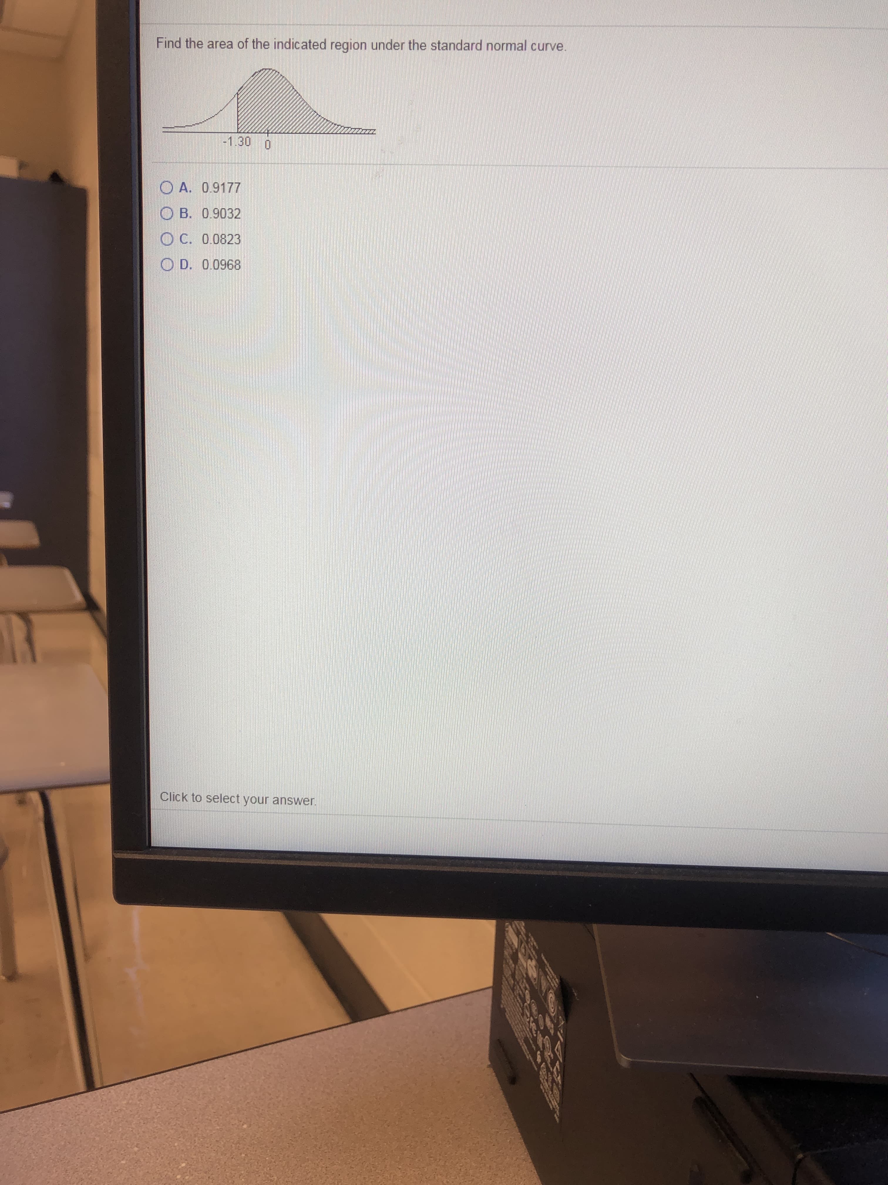 Find the area of the indicated region under the standard normal curve
-1.30 n
O A. 0.9177
OB. 0.9032
O C. 0.0823
O D. 0.0968
