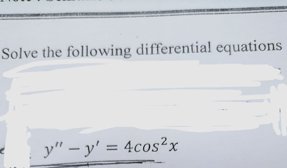 Solve the following differential equations
y" - y' = 4cos²x