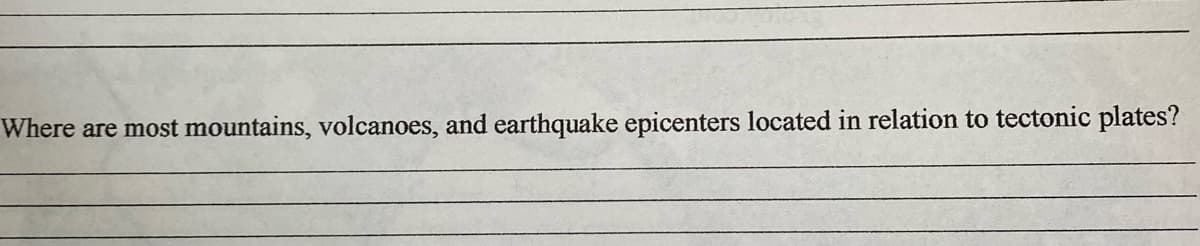 Where are most mountains, volcanoes, and earthquake epicenters located in relation to tectonic plates?

