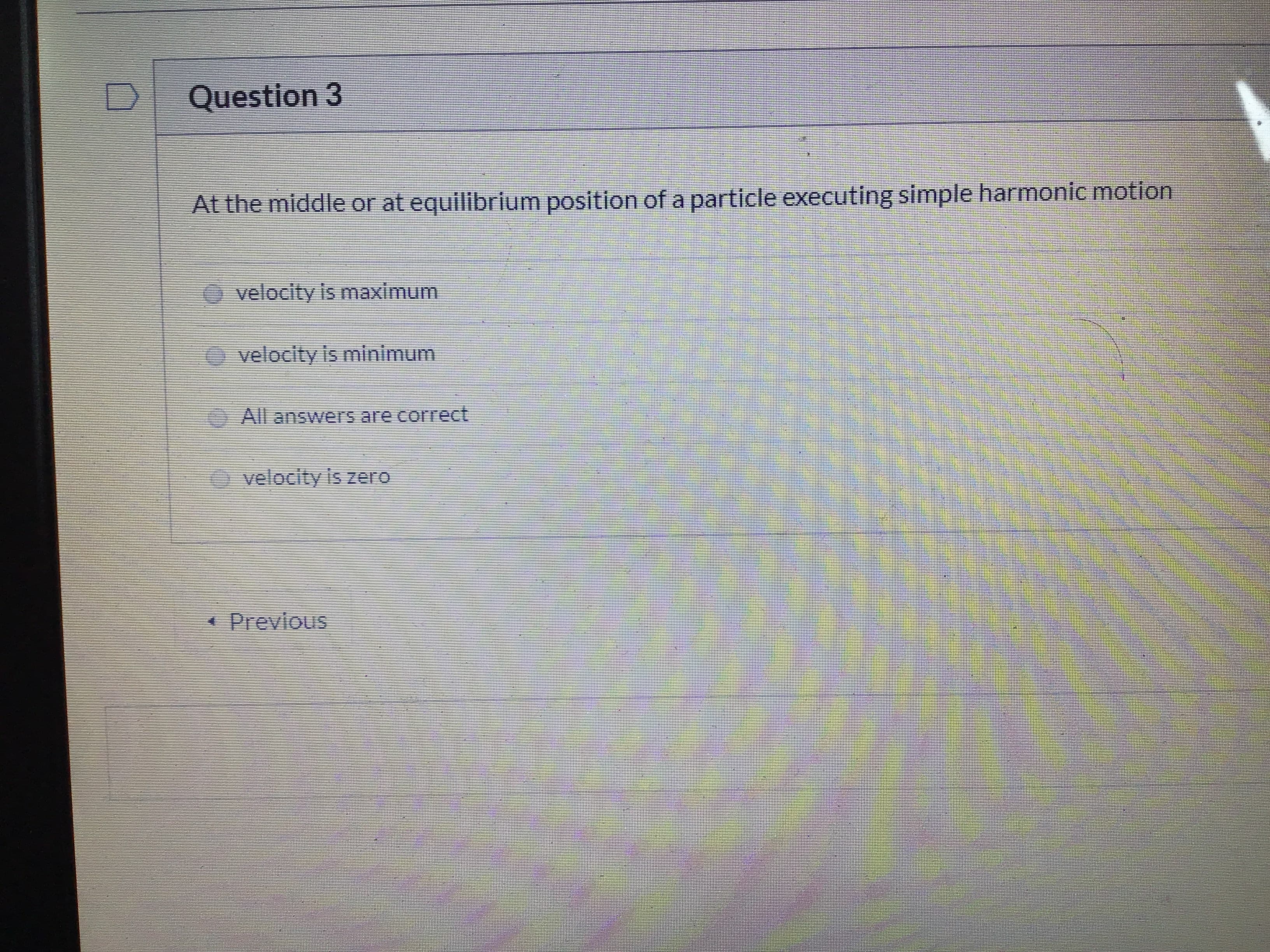 At the middle or at equilibrium position of a particle executing simple harmonic motion
